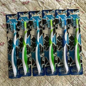 Oral-B Crossaction SOFT manual toothbrushes. 3 green. 3 blue. 6 yrs+